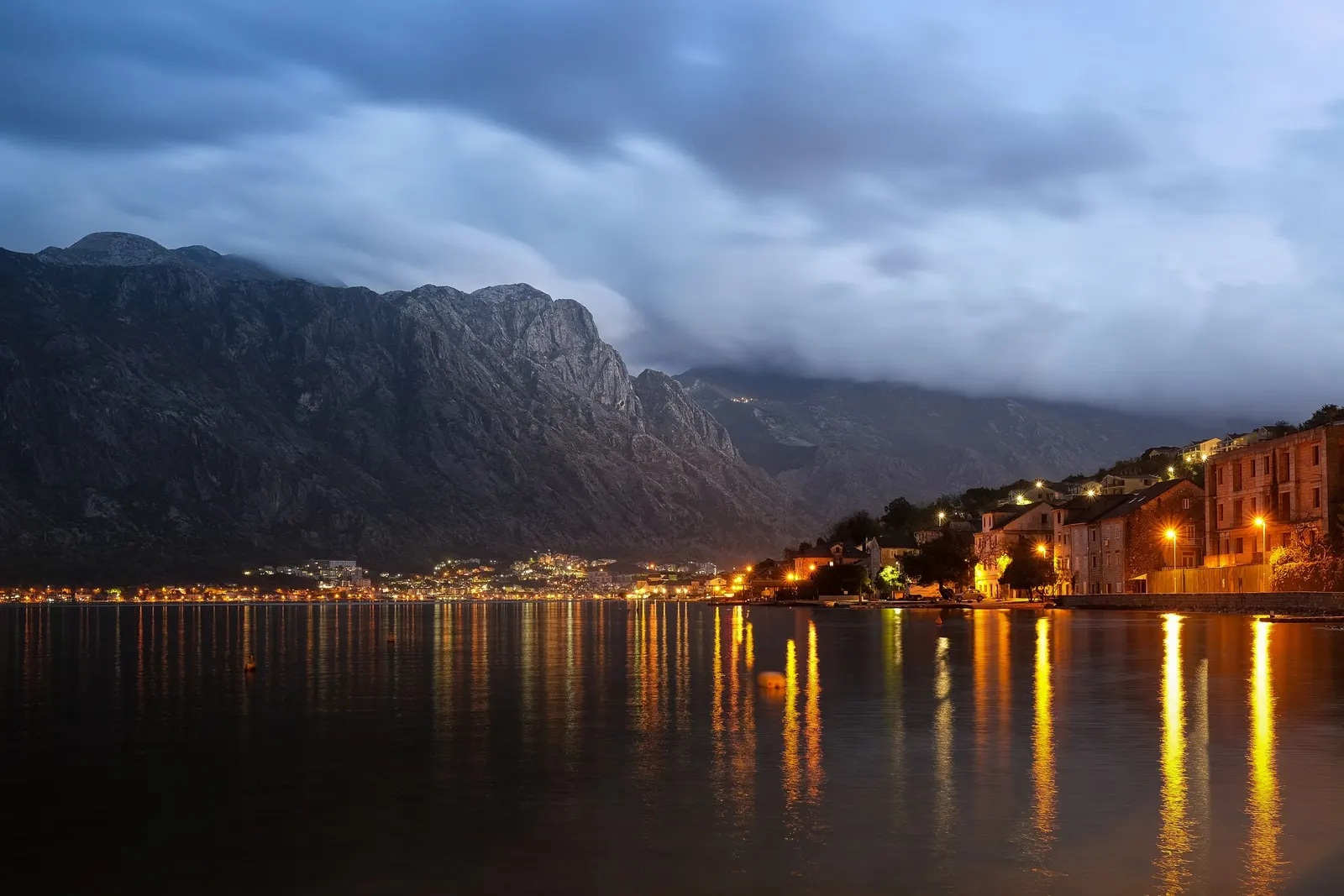 The Bay of Kotor at night, with the lights of the coast