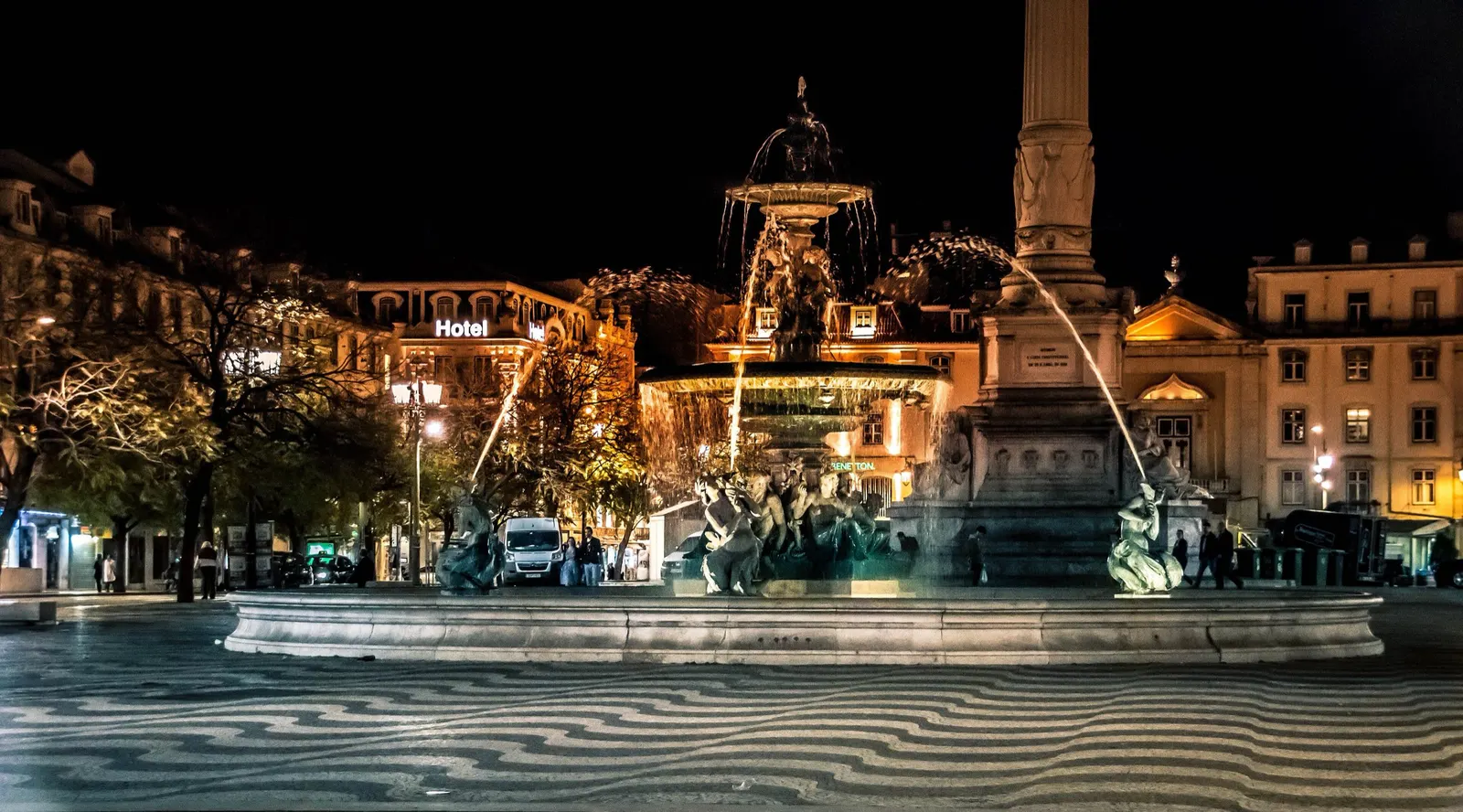Lisbon at night, the Rossio square and its fountain