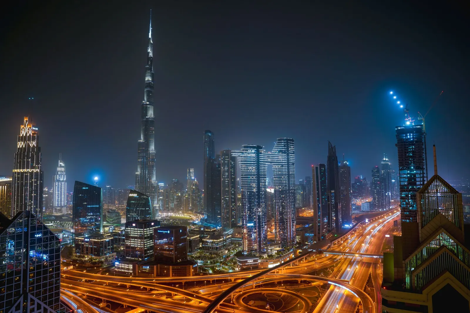 Downtown Dubai at night, with the Burj Khalifa